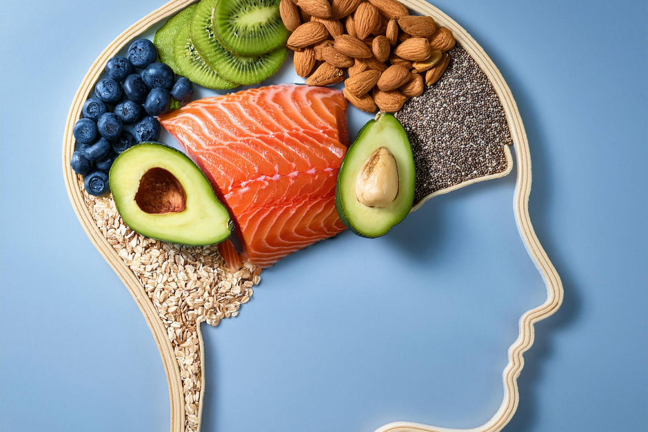 Illustration of a human head with the brain made up of food good for brain health.